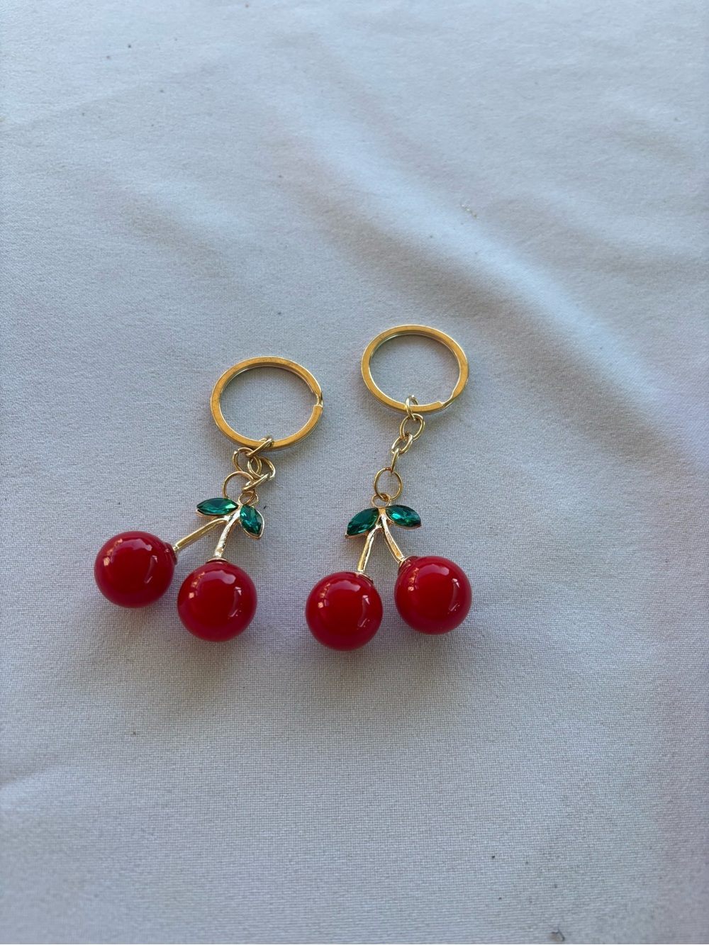 Gold Cherry Dangle Keychain Pair - Red & Green